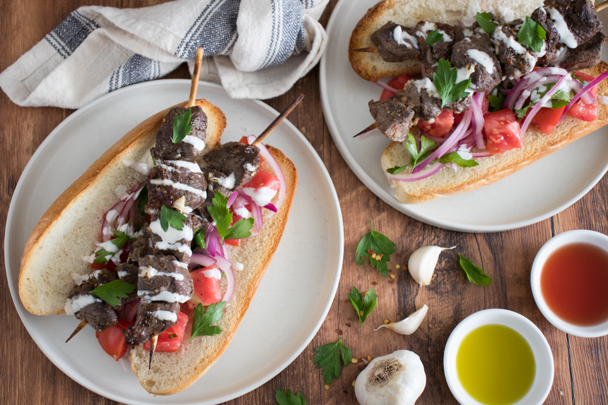 Beef Spiedies with Tomato and Onion Topping