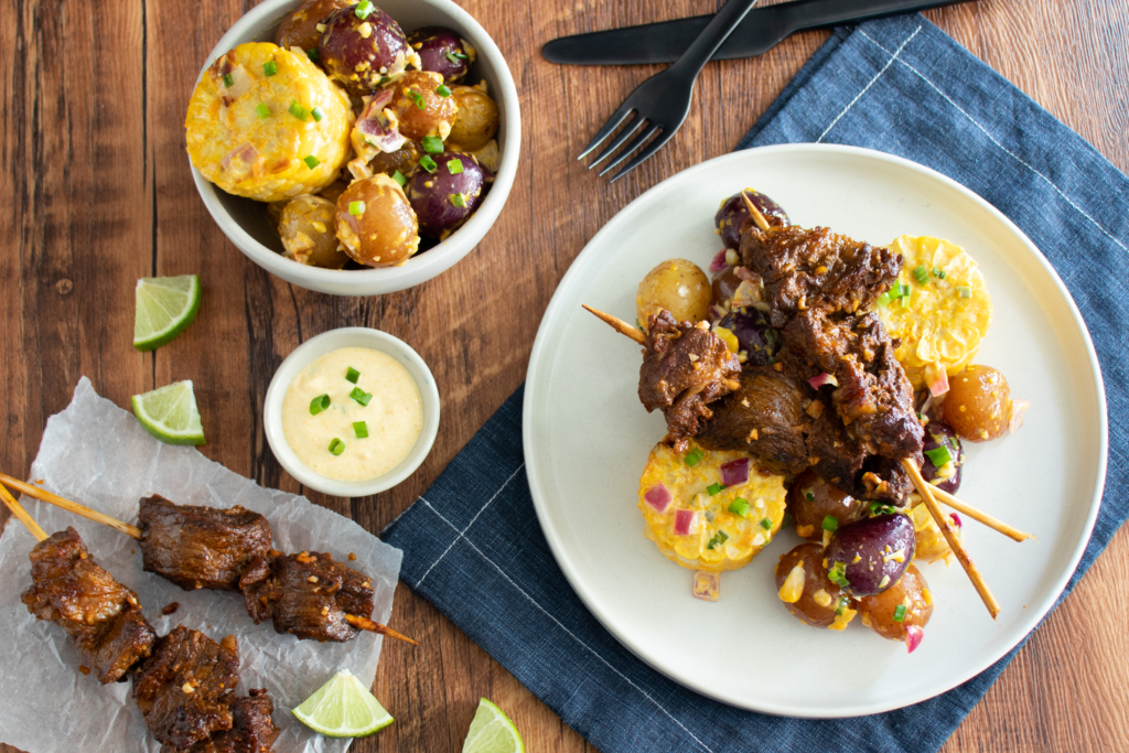 Beef Anticuchos with Warm Corn and Potato Salad